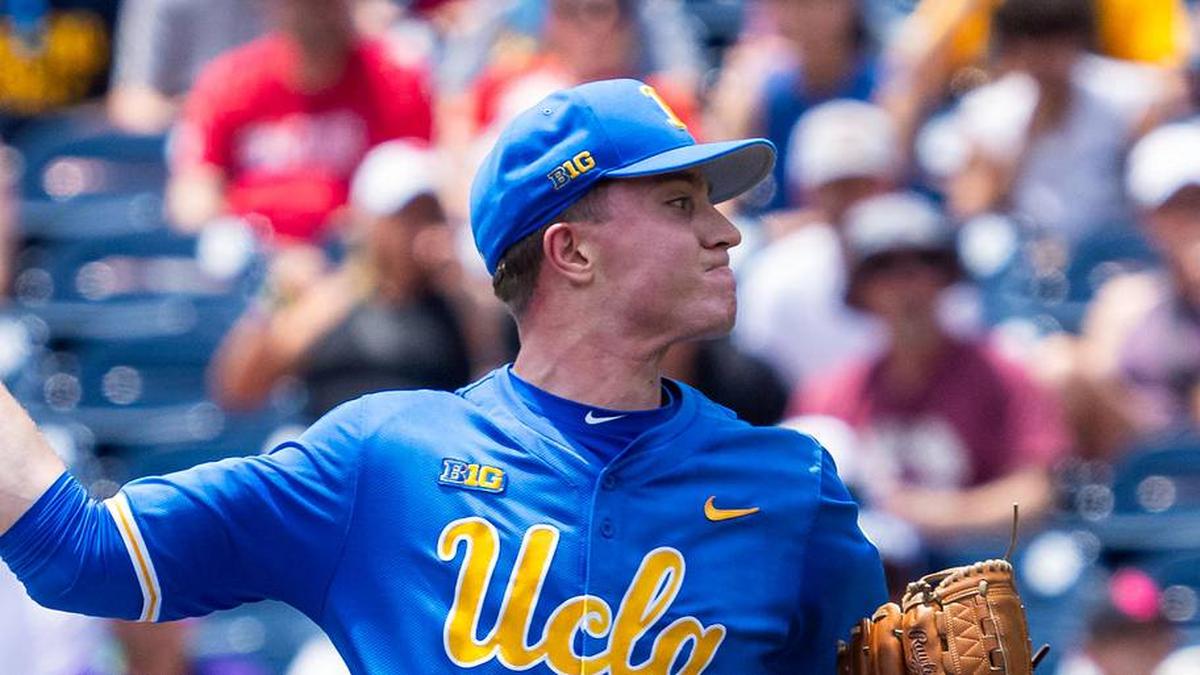 Jun 14, 2025; Omaha, Neb, USA; UCLA Bruins starting pitcher Michael Barnett (55) pitches against the Murray State Racers during the first inning at Charles Schwab Field. Mandatory Credit: Dylan Widger-Imagn Images | Dylan Widger-Imagn Images 