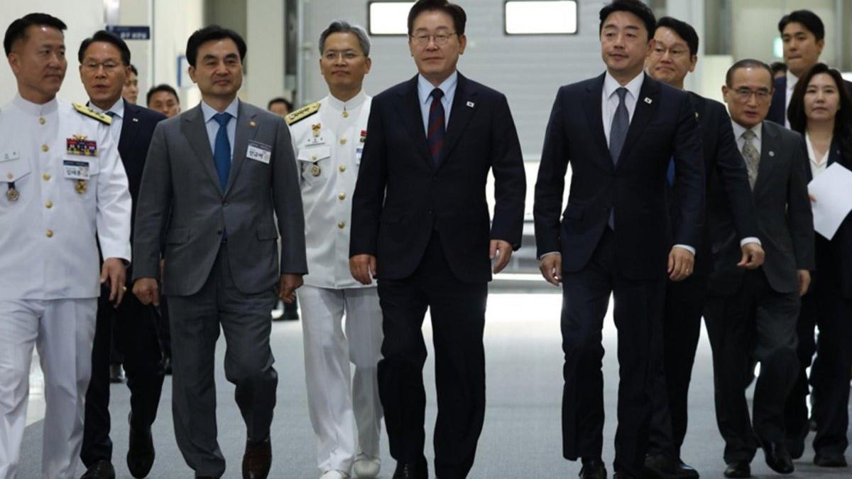 South Korean President Lee Jae Myung (C) walks with military leaders and other officials before presiding over a defense strategy committee meeting in Changwon, South Gyeongsang Province, South Korea, 26 May 2026. Photo by YONHAP / EPA