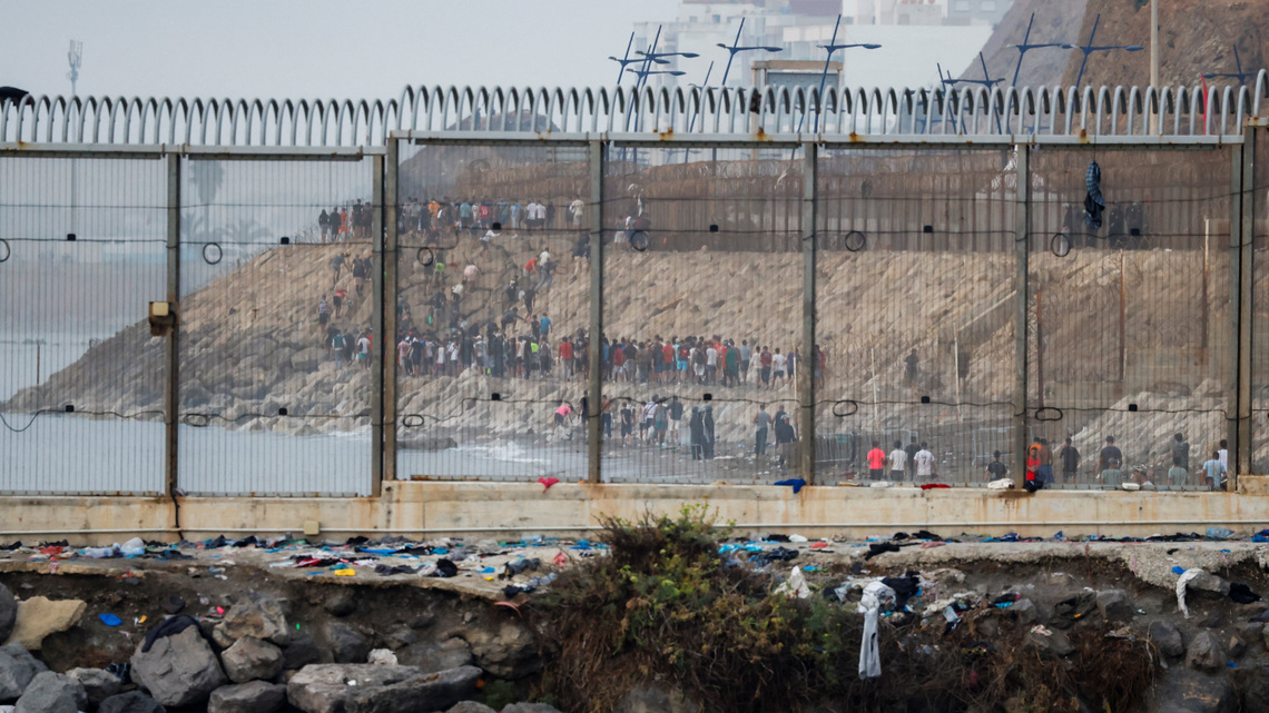 Spain installs floating barrier in Ceuta after calm night following border rush 