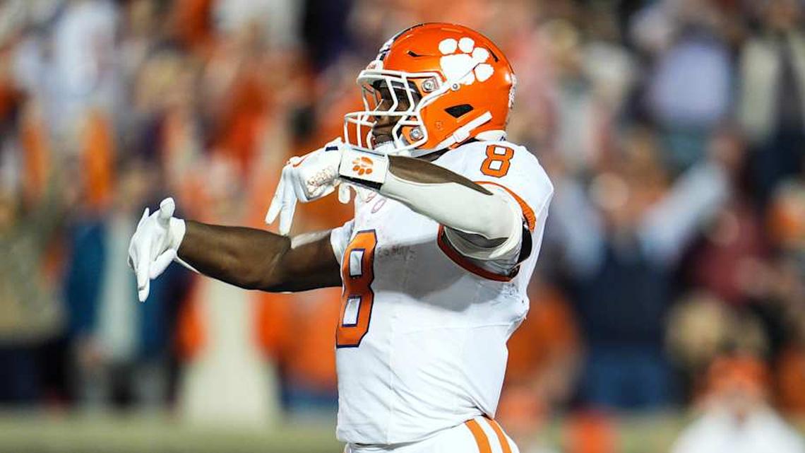  Clemson Tigers running back Adam Randall (8) throws down Ls after scoring a Tiger touchdown to take the lead over Louisville in the first half at L&N Stadium Friday, Nov. 14, 2025. | Matt Stone/Courier Journal / USA TODAY NETWORK via Imagn Images 