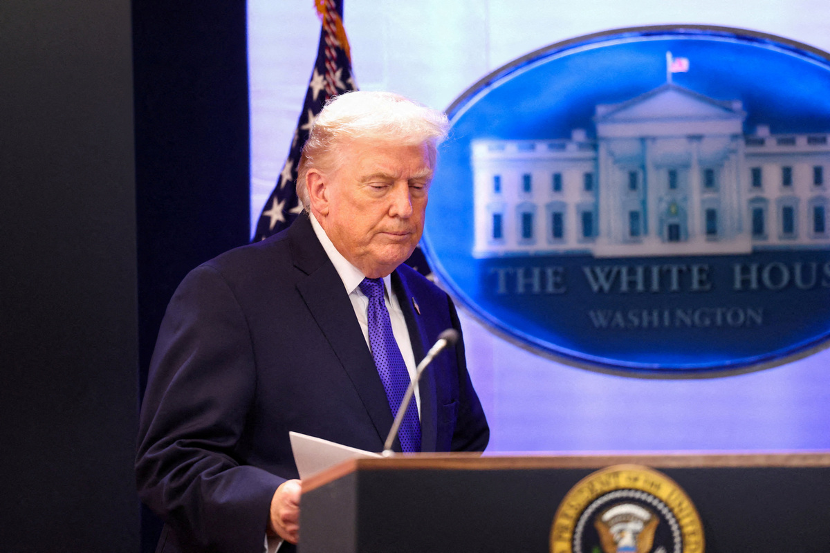 FILE PHOTO: U.S. President Donald Trump arrives for a press briefing at the White House, following the Supreme Court's ruling that Trump had exceeded his authority when he imposed tariffs, in Washington, D.C., U.S., February 20, 2026. REUTERS/Kevin Lamarque/File Photo