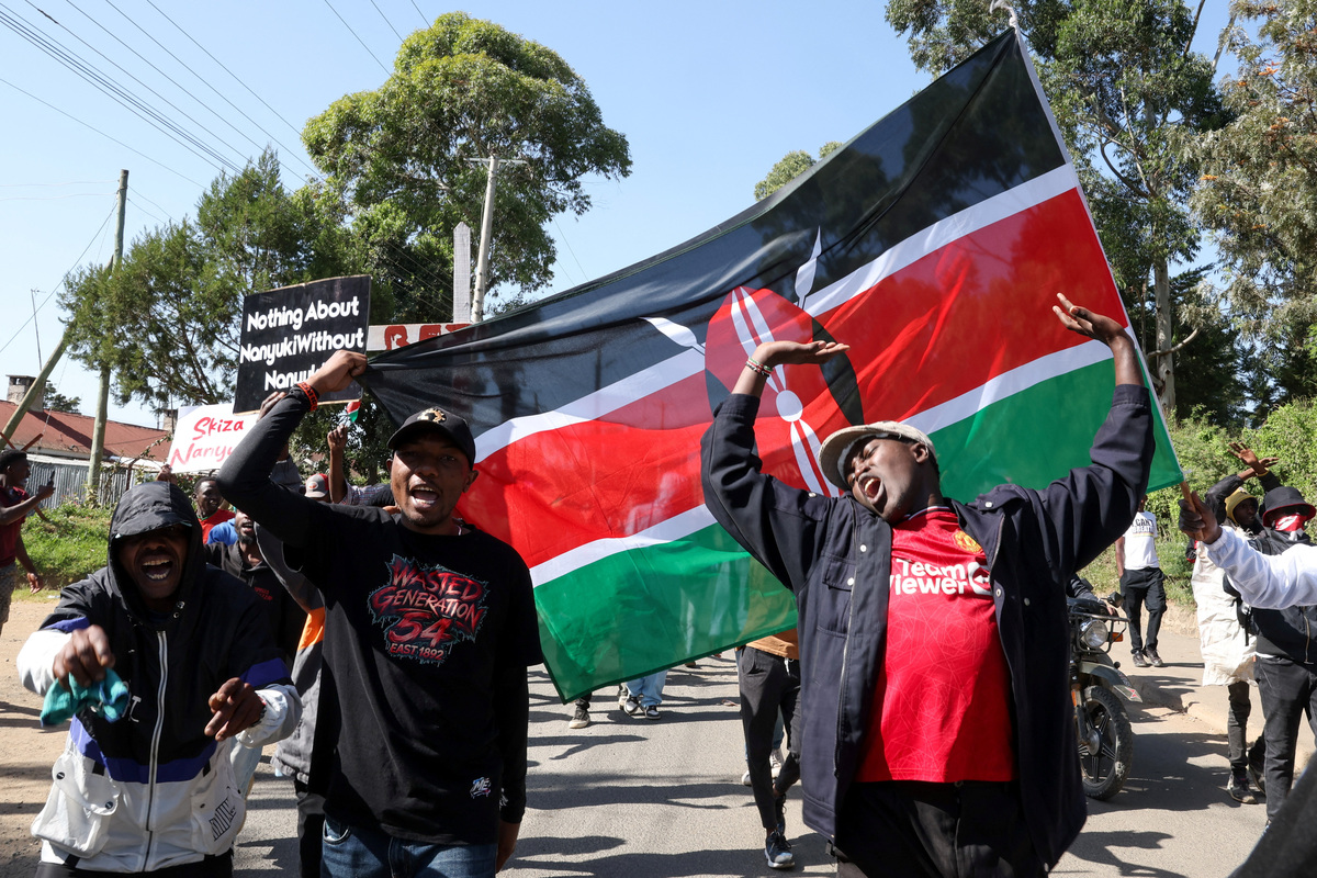 Demonstrators take part in a protest against a U.S.-backed Ebola quarantine plan to establish a 50-bed facility at a Kenyan air force base intended to host Americans exposed to Ebola, in Nanyuki town, Laikipia County, Kenya, June 9, 2026. REUTERS/Monicah Mwangi