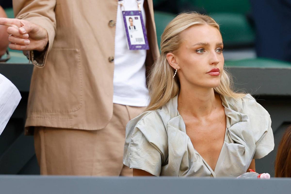  Jul 11, 2025; Wimbledon, United Kingdom; Morgan Riddle, girlfriend of Taylor Fritz (USA)(not pictured), sits in his player's box prior to the match against Carlos Alcaraz (ESP)(not pictured) in a gentlemen's singles semi-final on day twelve of The Championships Wimbledon 2025 at All England Lawn Tennis and Croquet Club. Mandatory Credit: Geoff Burke-Imagn Images 