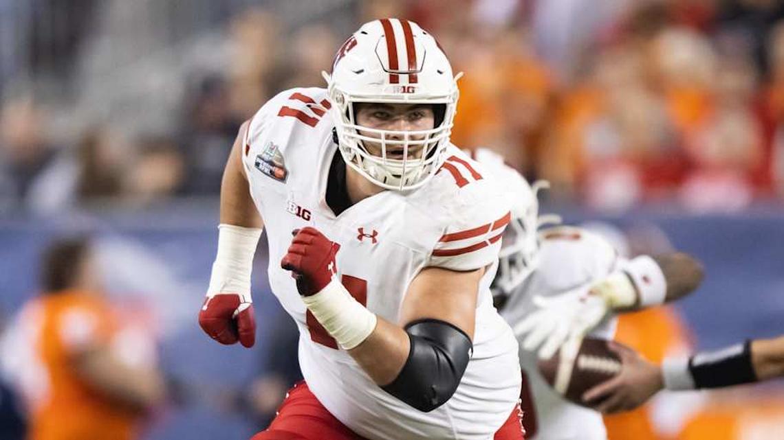  Dec 27, 2022; Phoenix, Arizona, USA; Wisconsin Badgers offensive lineman Riley Mahlman (71) against the Oklahoma State Cowboys during the 2022 Guaranteed Rate Bowl at Chase Field. Mandatory Credit: Mark J. Rebilas-Imagn Images | Mark J. Rebilas-Imagn Images 