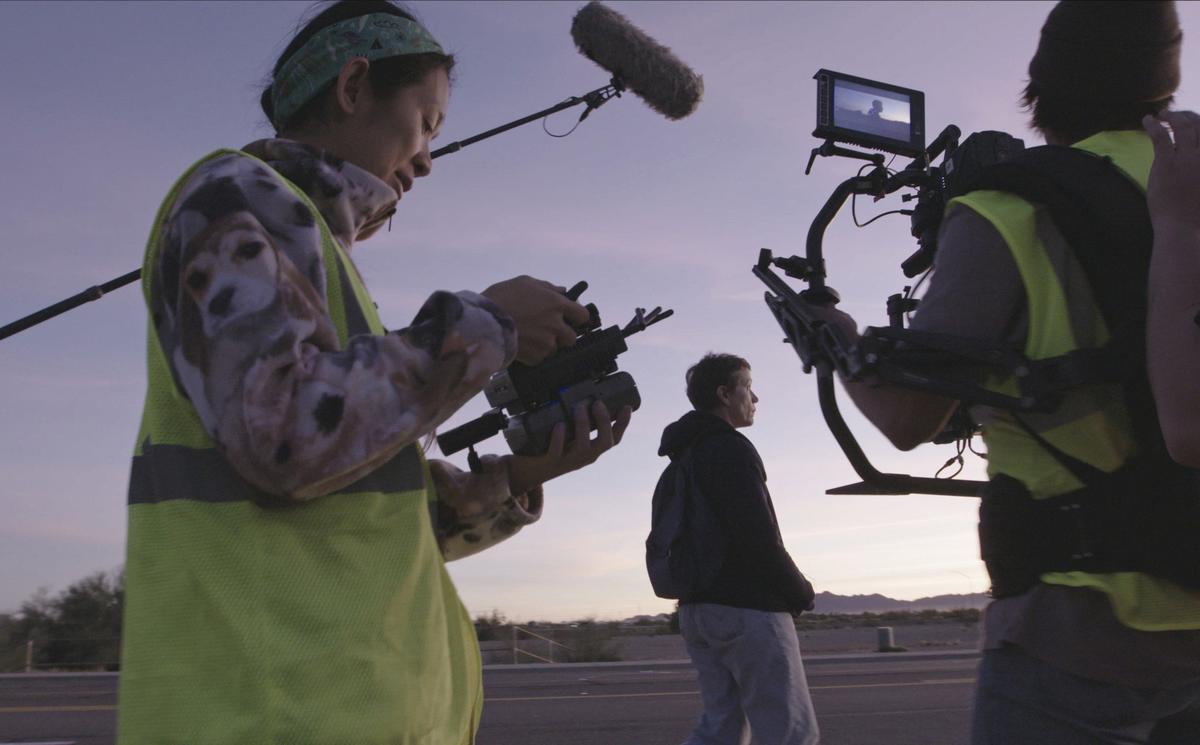 Writer-director Chloé Zhao, left, and actress Frances McDormand on the set of “Nomadland.”