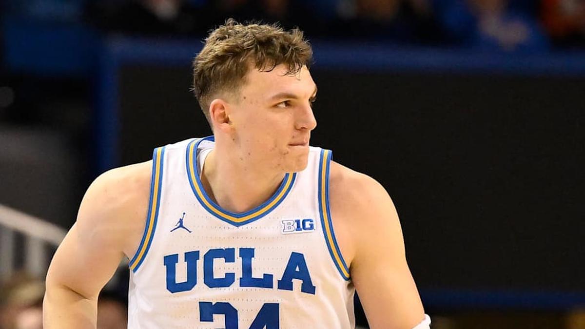  Feb 21, 2026; Los Angeles, California, USA; UCLA forward Tyler Bilodeau (34) runs back on defense after scoring a three-point basket during the second half against the Illinois Fighting Illini at Pauley Pavilion presented by Wescom Financial. Mandatory Credit: Robert Hanashiro-Imagn Images | Robert Hanashiro-Imagn Images 