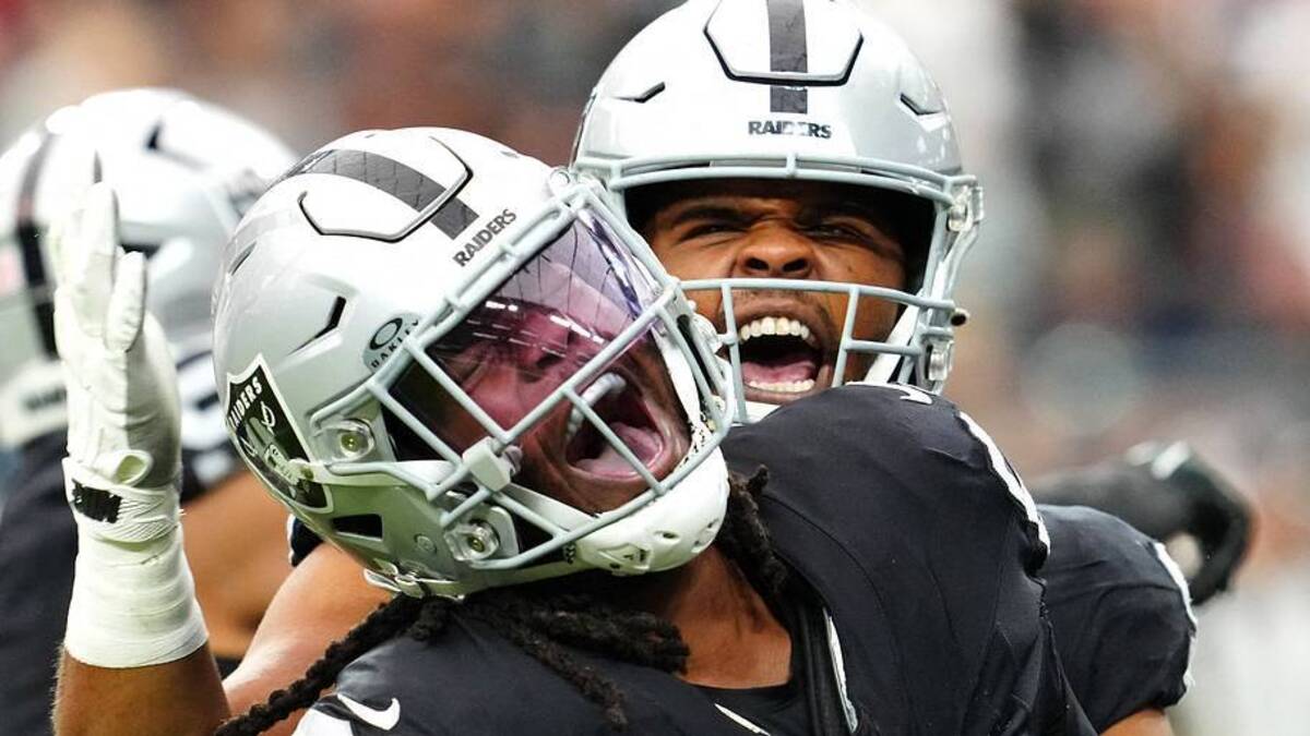  Oct 15, 2023; Paradise, Nevada, USA; Las Vegas Raiders defensive tackle Adam Butler (69) celebrates with Las Vegas Raiders defensive tackle Jerry Tillery (90) after making a play against the New England Patriots during the first quarter at Allegiant Stadium. Mandatory Credit: Stephen R. Sylvanie-USA TODAY Sports | USA TODAY Sports via Reuters Connect 