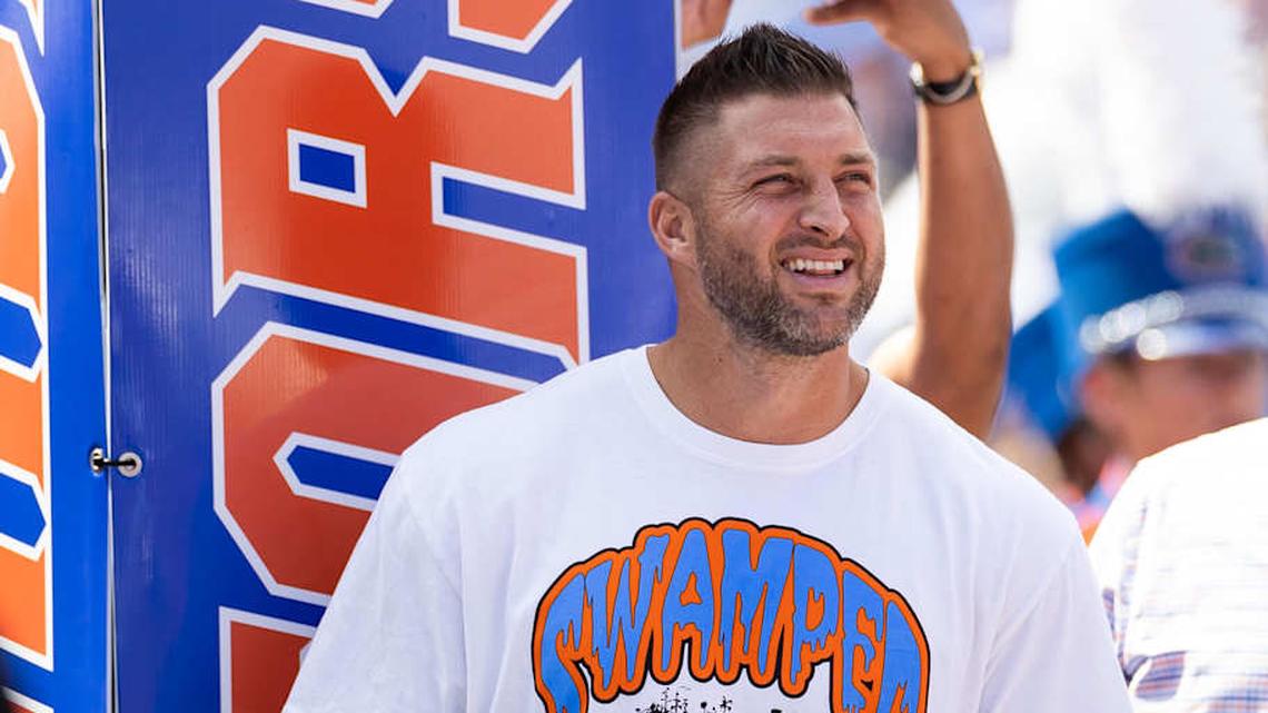 Watch Tim Tebow Walk Morgan Wallen Out for Concert in the Swamp