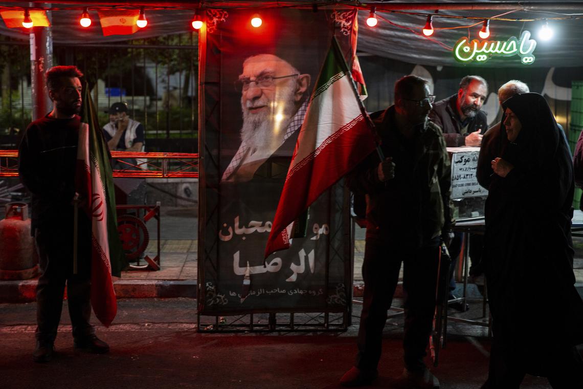 An image of Ayatollah Ali Khamenei, Iran's late supreme leader, at a pro-government demonstration in Enghelab Square in Tehran, Iran on Wednesday, April 22, 2026. The killing of Ayatollah Ali Khamenei has ushered in a new form of collective leadership, with more power for the generals of the Revolutionary Guard. (Arash Khamooshi/The New York Times)