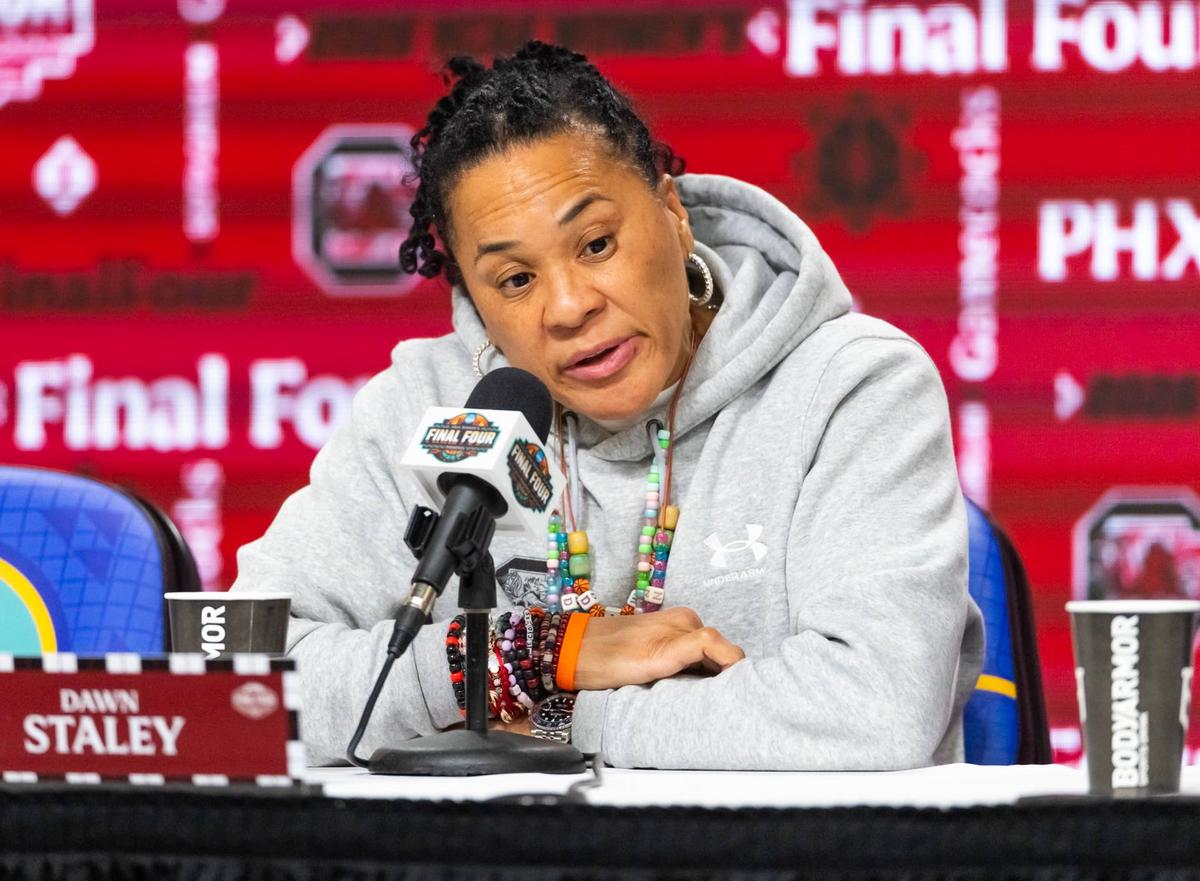  Apr 4, 2026; Phoenix, AZ, USA; South Carolina Gamecocks head coach Dawn Staley speaks to the media during a press conference at the Final Four National Championship Practice at Mortgage Matchup Center. Mandatory Credit: Mark J. Rebilas-Imagn Images 