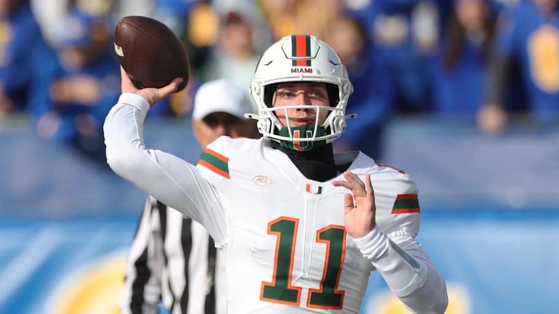  Nov 29, 2025; Pittsburgh, Pennsylvania, USA; Miami Hurricanes quarterback Carson Beck (11) passes against the Pittsburgh Panthers during the first quarter at Acrisure Stadium. Mandatory Credit: Charles LeClaire-Imagn Images | Charles LeClaire-Imagn Images 
