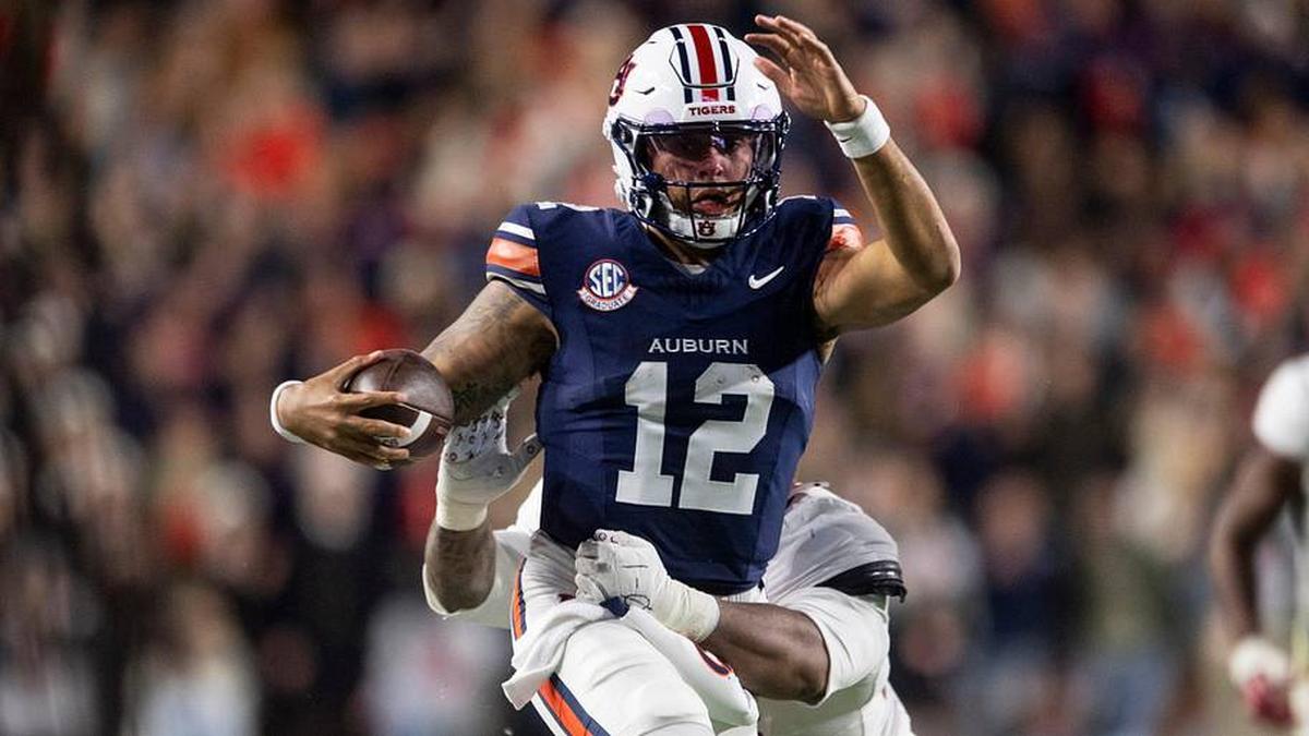  Auburn Tigers quarterback Ashton Daniels (12) runs the ball as Auburn Tigers take on Alabama Crimson Tide in the Iron Bowl at Jordan-Hare Stadium in Auburn, Ala. on Saturday, Nov. 29, 2025. Alabama Crimson Tide leads Auburn Tigers 17-6. | Jake Crandall/ Advertiser / USA TODAY NETWORK via Imagn Images 