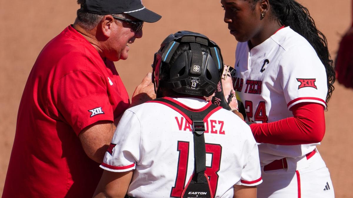 Texas Tech head coach Gerry Glasco talks to NiJaree Canady and Victoria Valdez during the Lubbock Regional of the NCAA Division I softball tournament, Saturday, May 16, 2026, at Tracy Sellers Field.