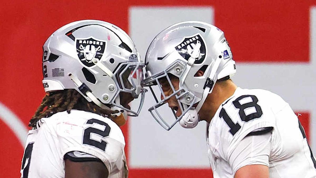  Dec 21, 2025; Houston, Texas, USA; Las Vegas Raiders wide receiver Jack Bech (18) celebrates running back Ashton Jeanty (2) touchdown reception against the Houston Texans in the second half at NRG Stadium. Mandatory Credit: Thomas Shea-Imagn Images | Thomas Shea-Imagn Images 