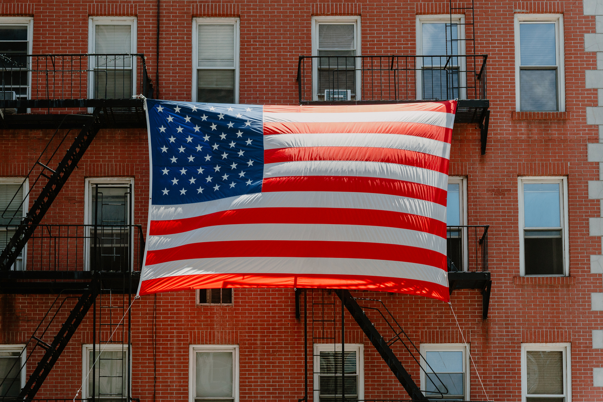 An American flag flies from a building along York Avenue on Manhattan's Upper East Side in New York, July 3, 2026. America celebrates the 250th anniversary of its independence today, with people from one end of the country to the other marking the milestone with fireworks, parades and concerts. (Lucia Vazquez/The New York Times)