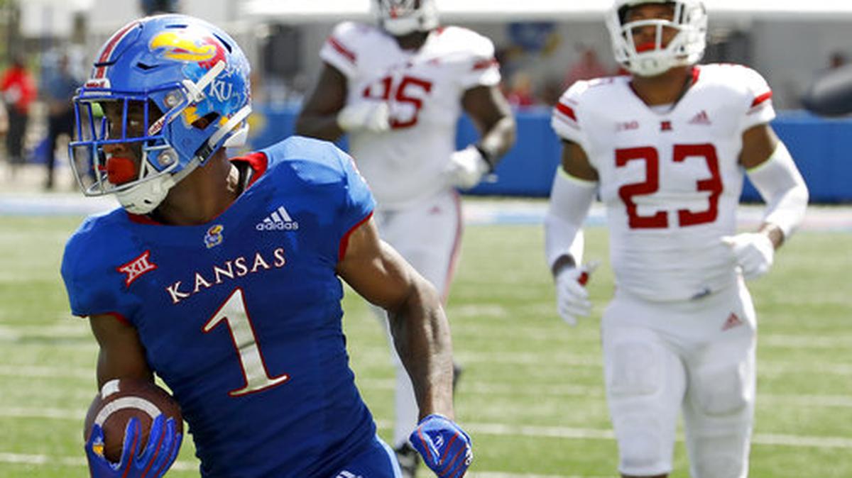 Kansas running back Pooka Williams Jr. (1) runs the ball for a touchdown during the second half of an NCAA college football game against Rutgers Saturday, Sept. 15, 2018, in Lawrence, Kan. Kansas won 55-14.