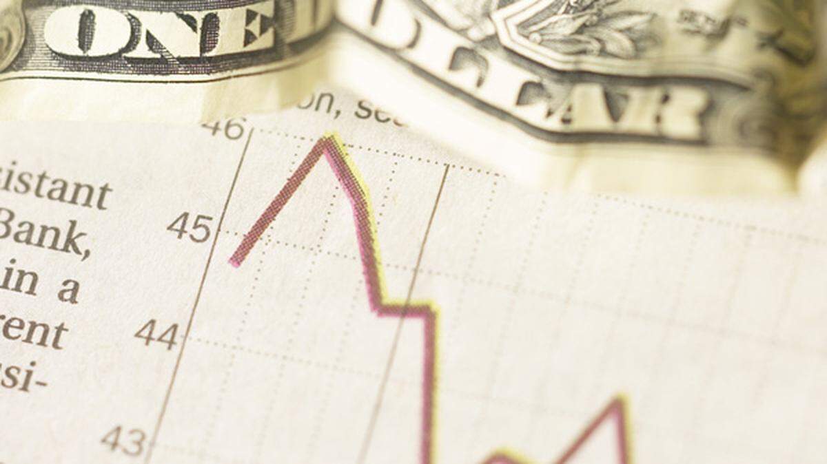 Chart and dollar bill