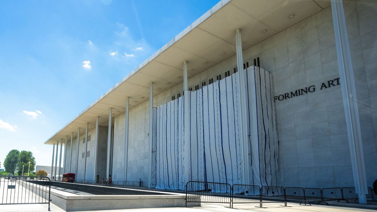 A tarp covers the sign for the Donald J. Trump and The John F. Kennedy Memorial Center for the Performing Arts in Washington, D.C., last week as federal employees complied with a court order to remove Trump's name from the building. Photo by Aaron Schwartz/UPI