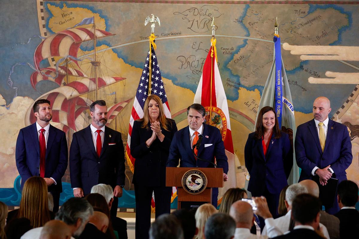 Acting U.S. Attorney General, Todd Blanche speaks, while with U.S. Attorney for the Southern District of Florida, Jason A. Reding Quinones, President of Miami Dade College Madeline Pumariega, Co-Deputy Director of the FBI, Christopher Gilbert Raia, U.S. Senator Ashley Moody (R-FL) and Florida Attorney General James Uthmeier, as the U.S. Department of Justice announces criminal charges against former Cuban President Raul Castro, during a ceremony to honor the victims of the 1996 shootdown of Brothers to the Rescue aircraft incident, at Freedom Tower in Miami, Florida, U.S., May 20, 2026. REUTERS/Marco Bello