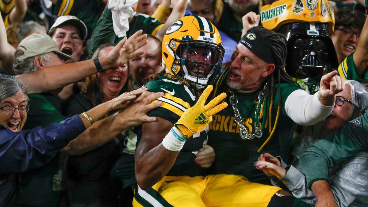 Green Bay Packers’ Aaron Jones celebrates his touchdown run during the second half of an NFL football game against the Detroit Lions Monday, Sept. 20, 2021, in Green Bay, Wis. (AP Photo/Matt Ludtke)