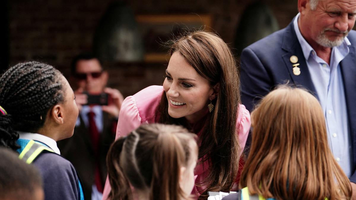 FILE PHOTO: The Princess of Wales speaks to pupils, after taking part in the first Children's Picnic at the RHS Chelsea Flower Show, at the Royal Hospital Chelsea, London, Britain, May 22, 2023. Jordan Pettitt/Pool via REUTERS/File Photo