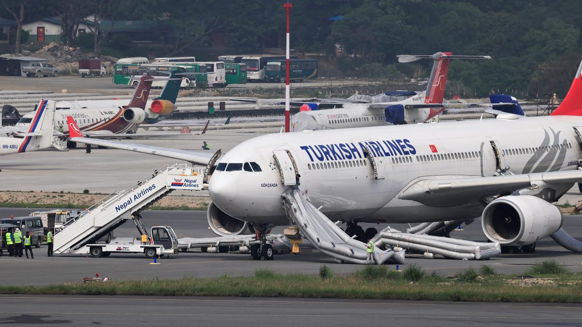 An airbus belonging to Turkish Airlines is parked at Tribhuvan International Airport after a minor fire broke out while landing in Kathmandu, Nepal May 11, 2026. REUTERS/Navesh Chitrakar