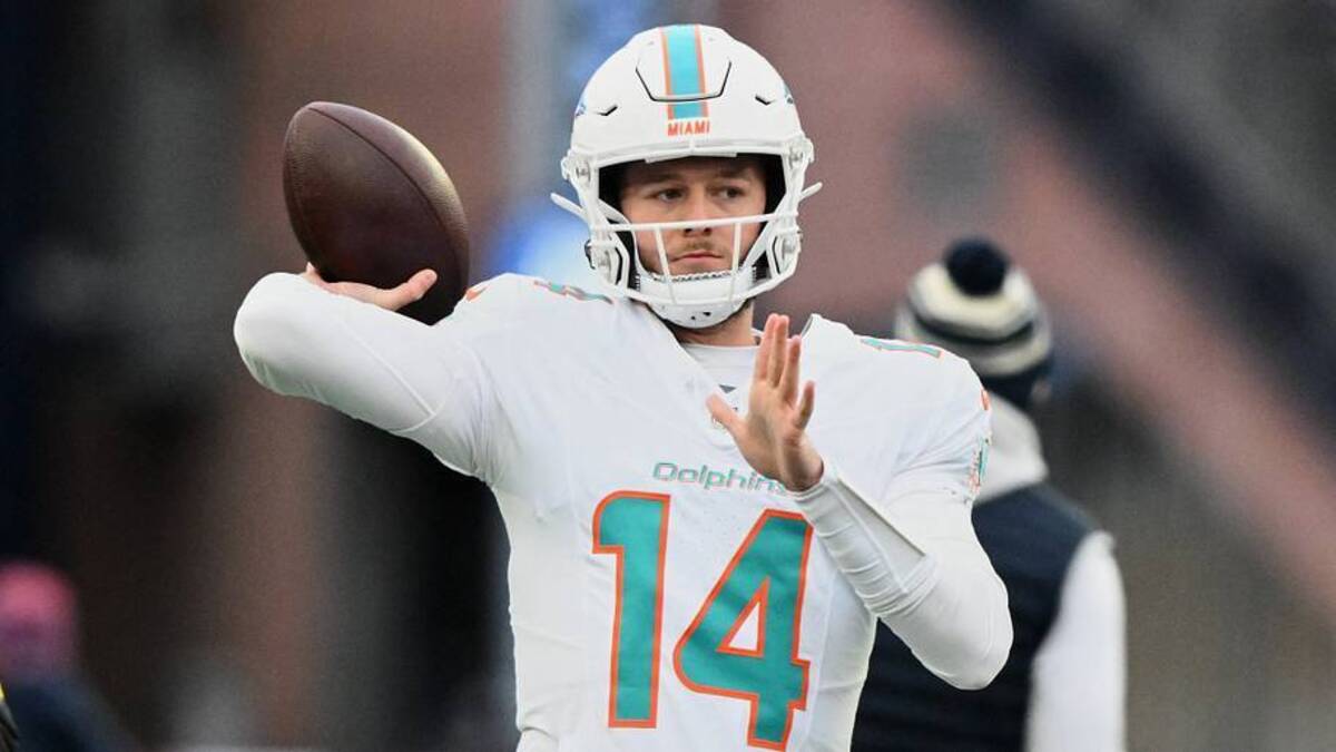 Miami Dolphins quarterback Quinn Ewers (14) throws a pass before the game against the New England Patriots at Gillette Stadium in the 2025 season finale. 