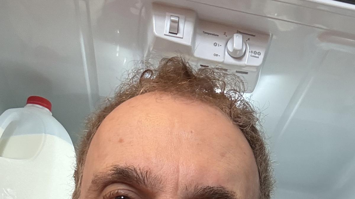 Jerry Zezima with his new refrigerator. (Jerry Zezima/TNS)