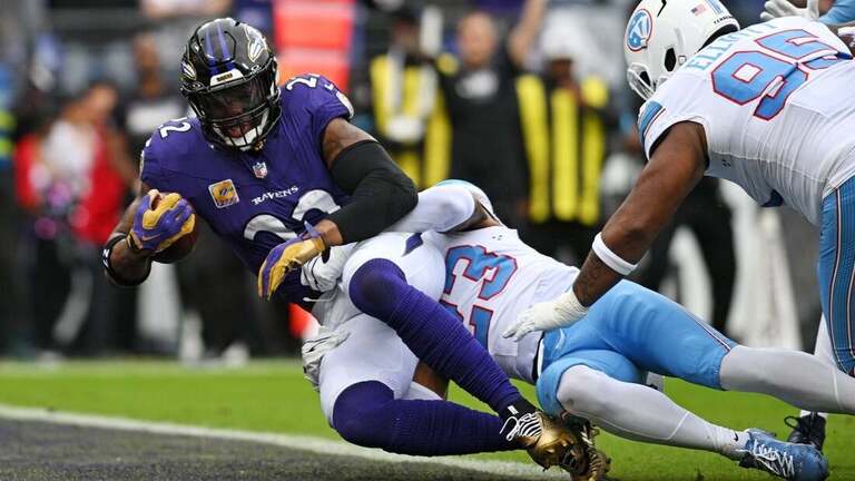 Lamar Jackson exits, Ravens hold on to beat Titans 