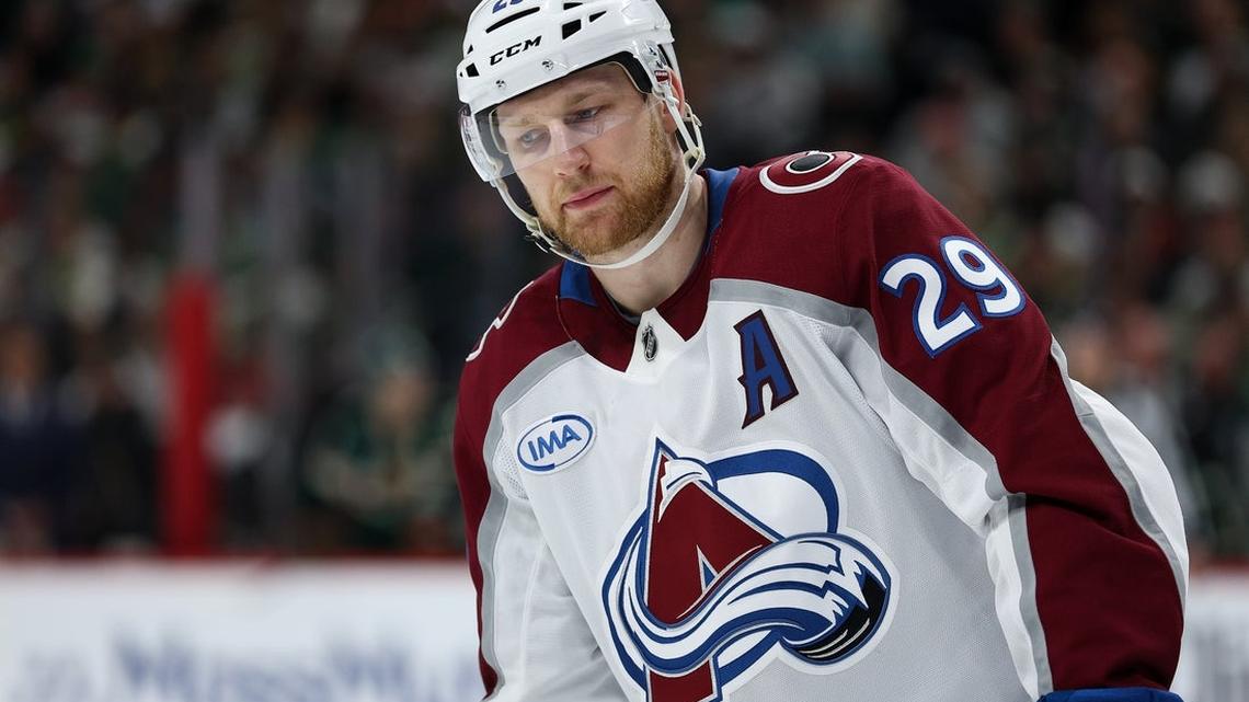 Avs' Nathan MacKinnon, bloodied by puck to face, returns to game 