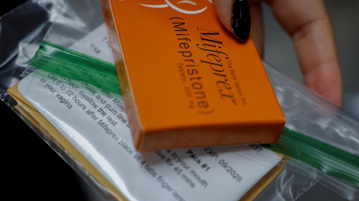 A staff member at Alamo Women's Clinic prepares Mifepristone, the first pill in a medical abortion, for a patient in Carbondale, Illinois, U.S., April 9, 2024. REUTERS/Evelyn Hockstein