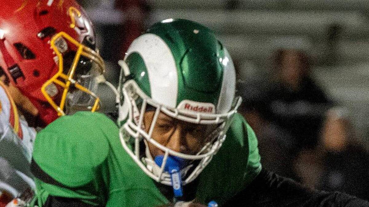  St. Mary's Kenneth Moore III, center, is tackled by Jesuit's Kwanna Smith, left, and Luke De Lyser during the Sac-Joaquin Section Div. II quarterfinal game at St. Mary's Sanguinetti Field in Stockton on Nov. 14, 2025. St. Mary's won 58-55. | CLIFFORD OTO/THE STOCKTON RECORD / USA TODAY NETWORK via Imagn Images 