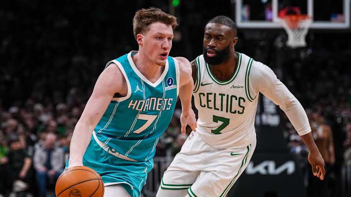  Apr 7, 2026; Boston, Massachusetts, USA; Charlotte Hornets guard Kon Knueppel (7) drives the ball against Boston Celtics guard Jaylen Brown (7) in the second half at TD Garden. Mandatory Credit: David Butler II-Imagn Images | David Butler II-Imagn Images 
