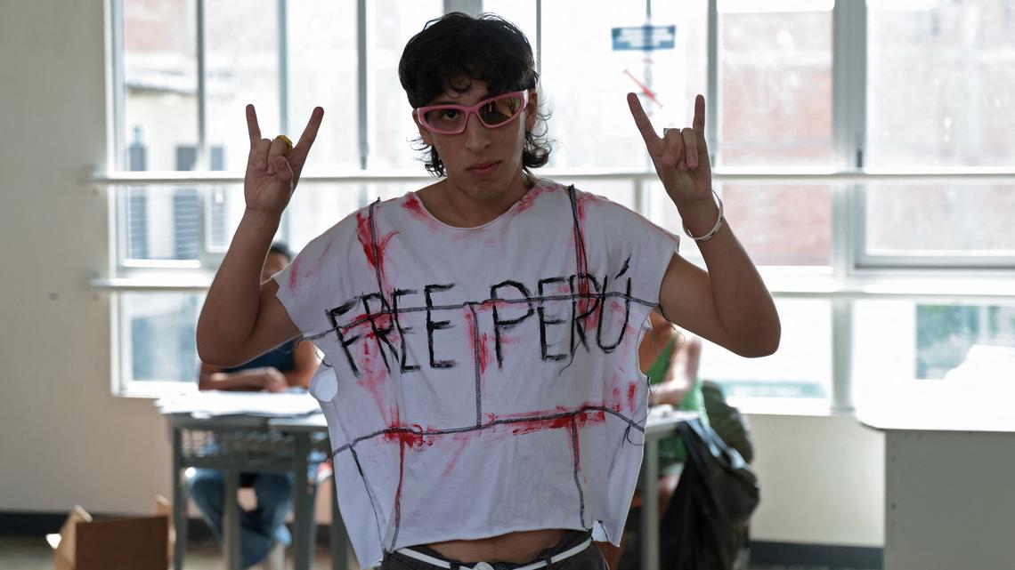 A voter gestures in Chorrillos, Lima province, Peru on Sunday, April 12, 2026, during presidential elections. Hourslong delays marred voting in Peru's presidential and legislative elections. (Connie France/AFP/Getty Images/TNS)