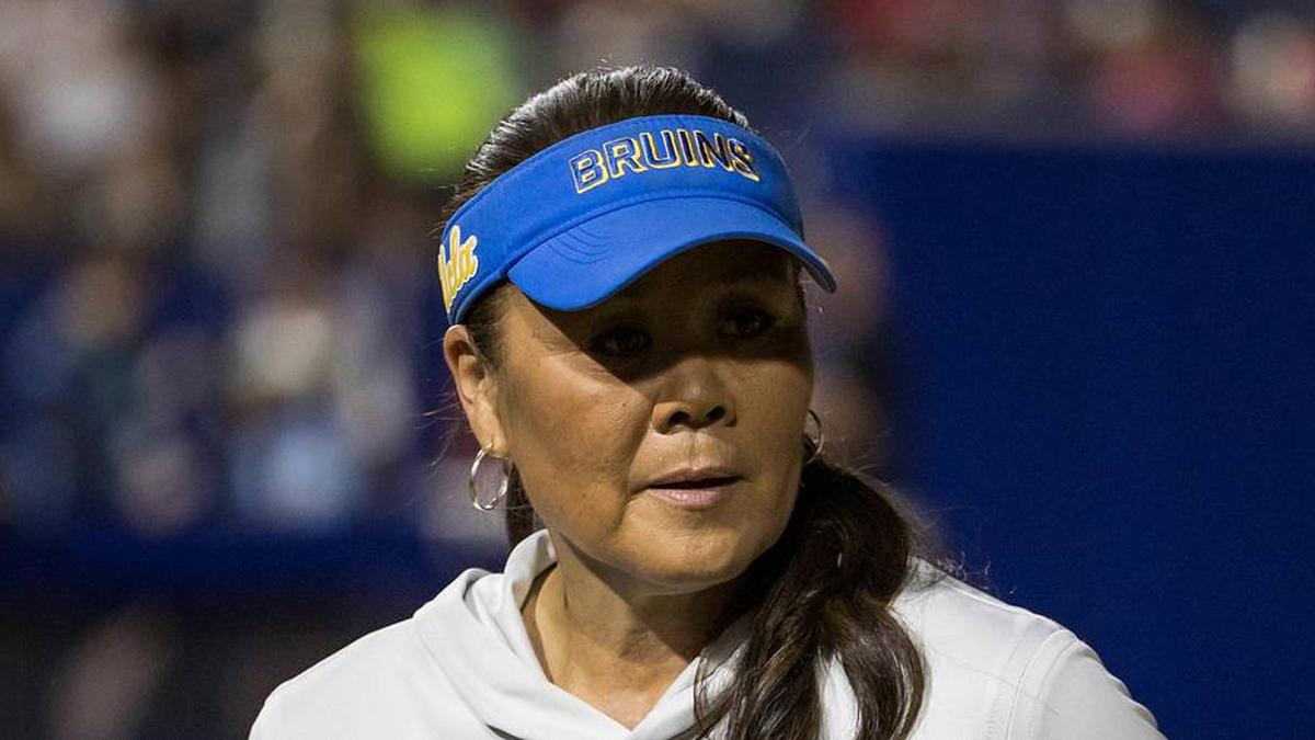  May 29, 2026; Oklahoma City, OK, USA; UCLA Bruins head coach Kelly Inouye-Perez heads back to the dugout during the fifth inning against the Arkansas Razorbacks during the NCAA Women's College World Series at Devon Park. Mandatory Credit: Brett Rojo-Imagn Images | Brett Rojo-Imagn Images 