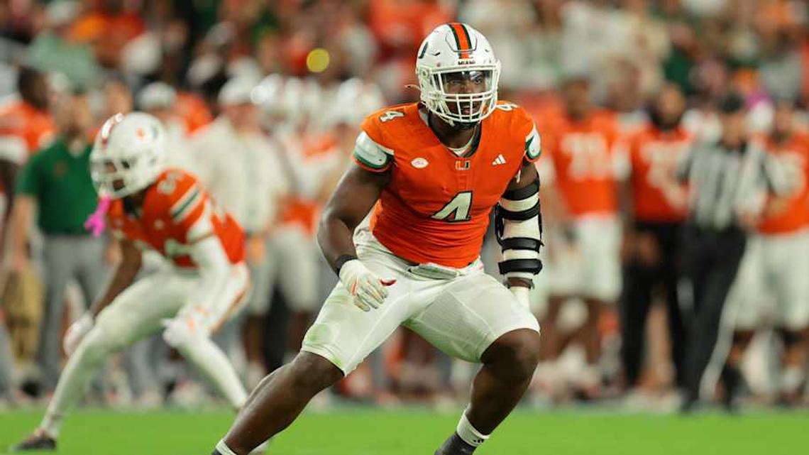  Oct 17, 2025; Miami Gardens, Florida, USA; Miami Hurricanes defensive lineman Rueben Bain Jr. (4) plays his position against the Louisville Cardinals during the third quarter at Hard Rock Stadium. Mandatory Credit: Sam Navarro-Imagn Images | Sam Navarro-Imagn Images 