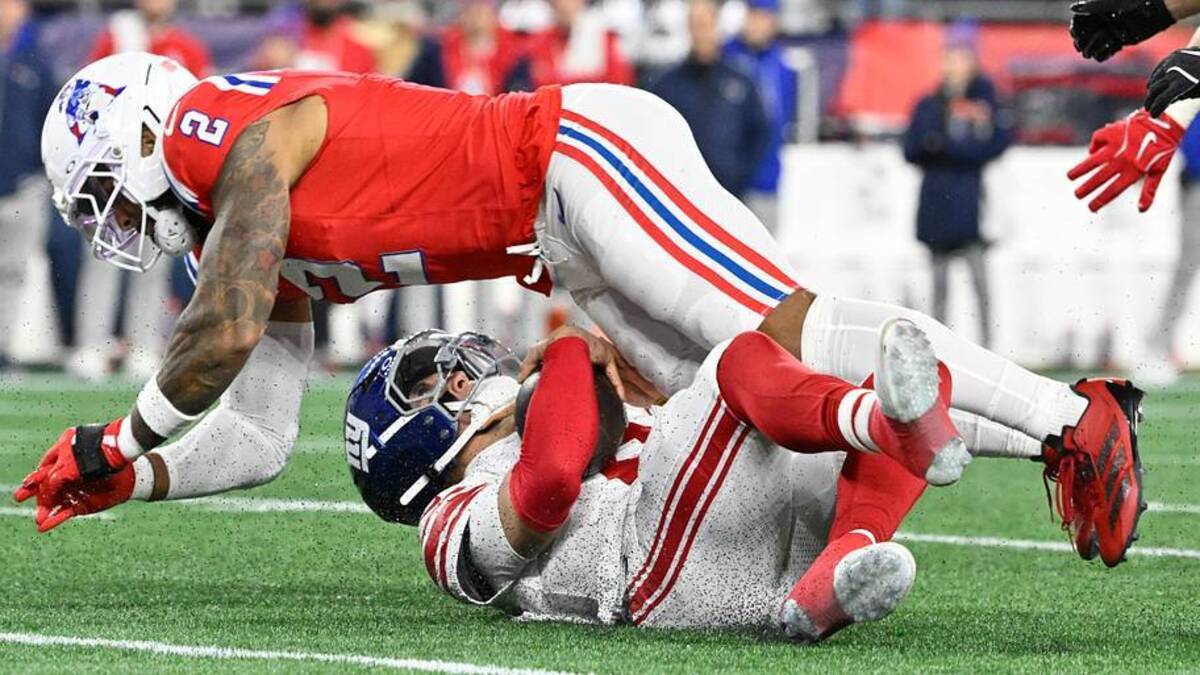 Dec 1, 2025; Foxborough, Massachusetts, USA; New England Patriots linebacker Harold Landry III (2) sacks New York Giants quarterback Jaxson Dart (6) during the first quarter at Gillette Stadium. Mandatory Credit: Eric Canha-Imagn Images | IMAGN IMAGES via Reuters Connect 