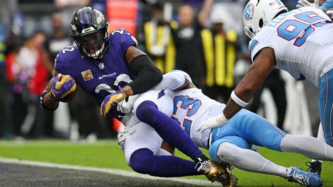 Lamar Jackson exits, Ravens hold on to beat Titans 