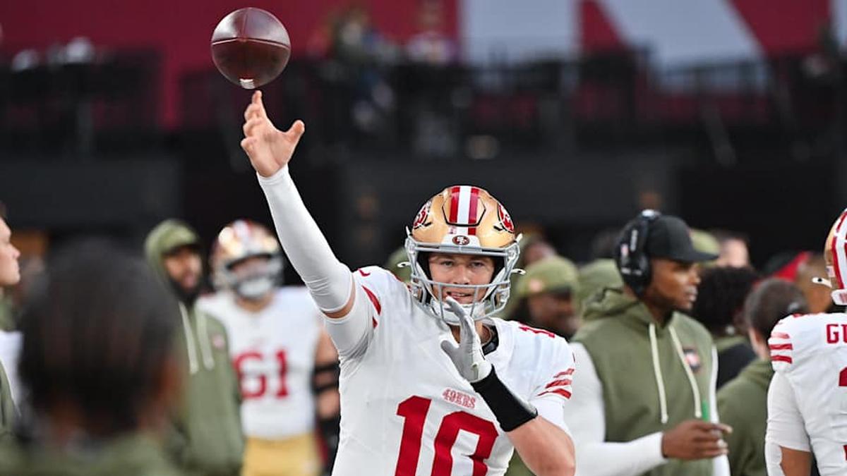 Nov 16, 2025; Glendale, Arizona, USA; San Francisco 49ers quarterback Mac Jones (10) warms up in the second half against the Arizona Cardinals at State Farm Stadium. Mandatory Credit: Matt Kartozian-Imagn Images. 