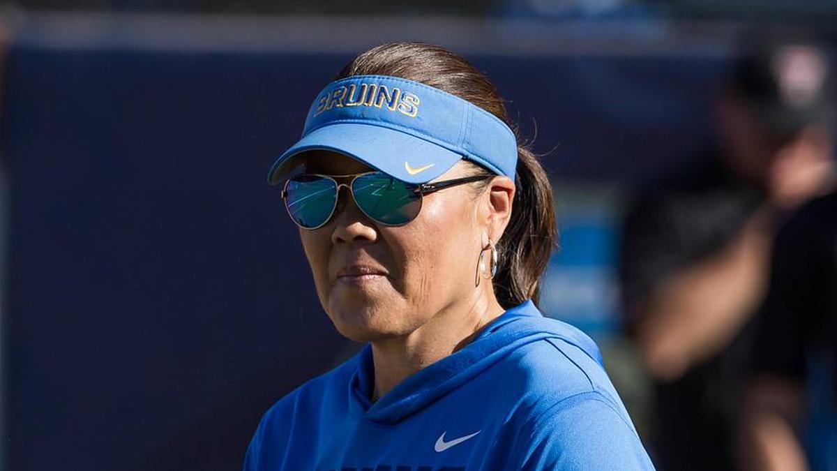  May 31, 2026; Oklahoma City, OK, USA; UCLA Bruins head coach Kelly Inouye-Perez looks on in the first inning against the Texas Tech Red Raiders during the NCAA Women's College World Series at Devon Park. Mandatory Credit: Brett Rojo-Imagn Images | Brett Rojo-Imagn Images 