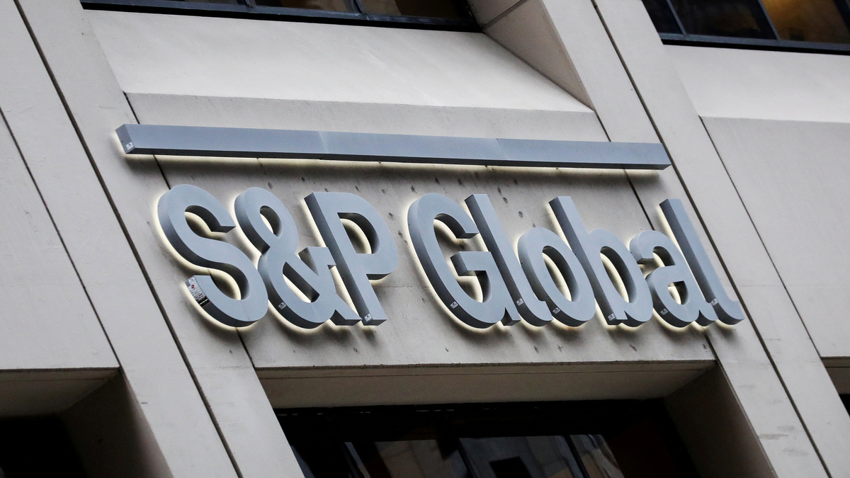 FILE PHOTO: The S&P Global logo is displayed on its offices in the financial district in New York City, U.S., December 13, 2018. REUTERS/Brendan McDermid/File Photo