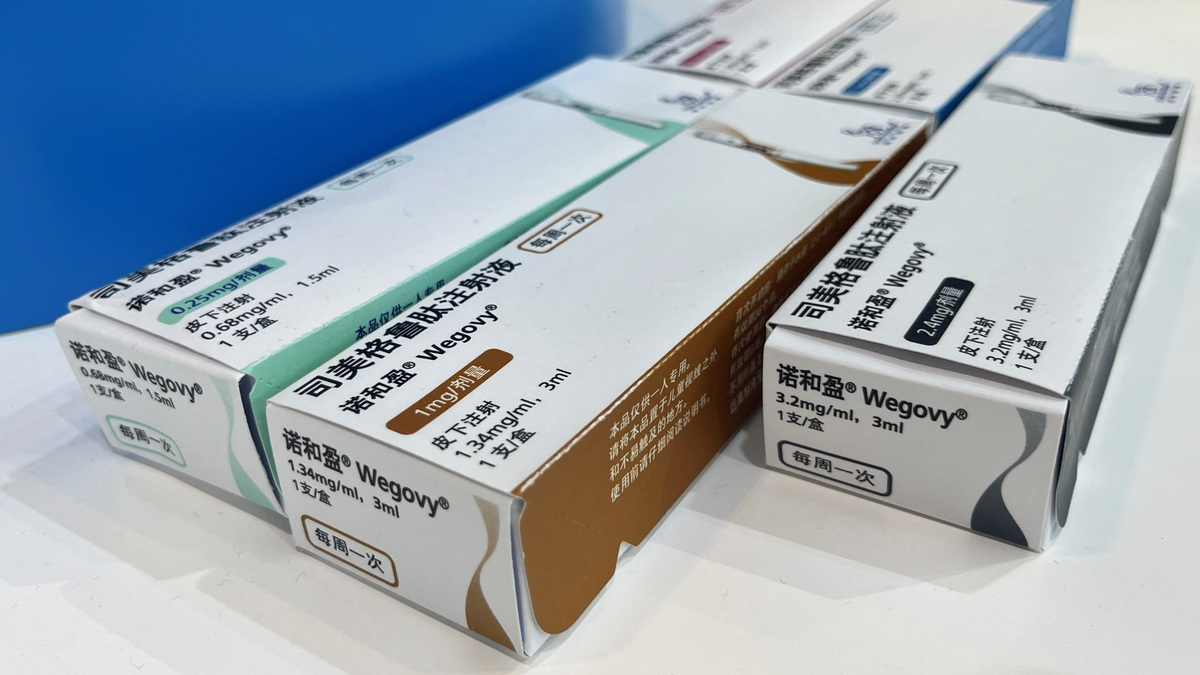 Wegovy injector pen boxes are displayed at the Novo Nordisk booth at the China Obesity Congress 2025 (COC2025) in Beijing, China August 17, 2025. REUTERS/Andrew Silver