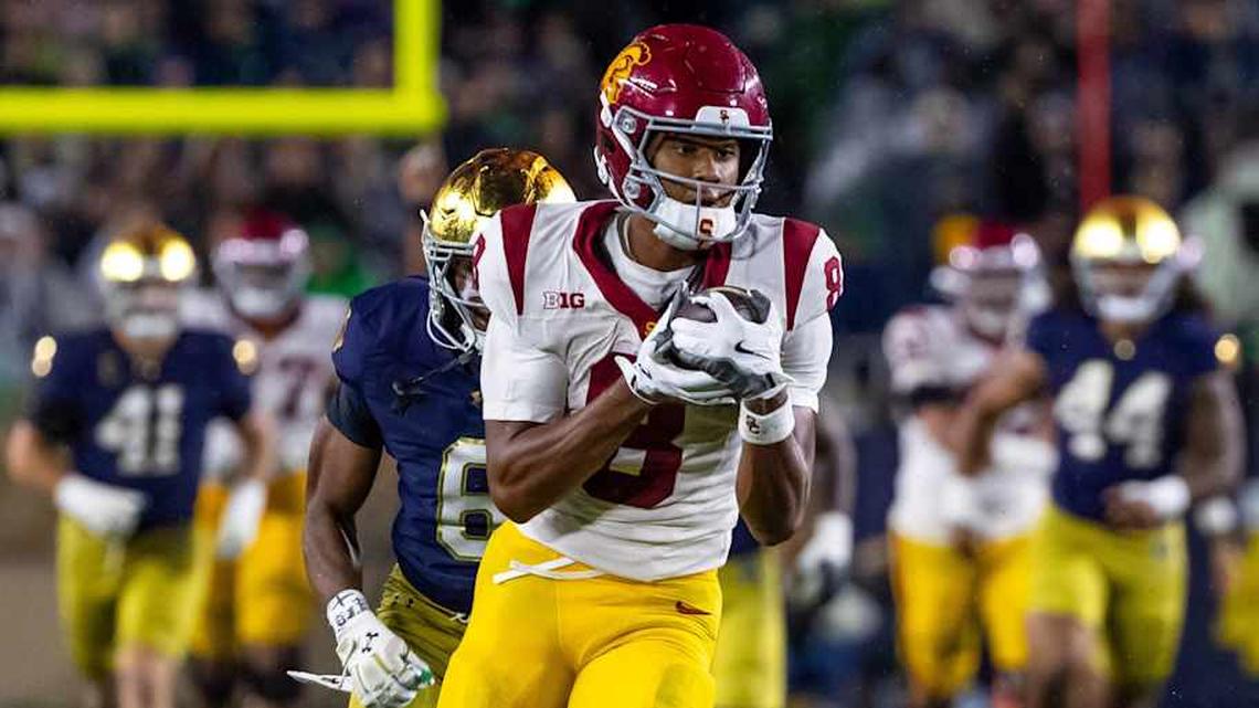  Oct 18, 2025; South Bend, Indiana, USA; Southern California Trojans wide receiver Ja'Kobi Lane (8) completes a reception against the Notre Dame Fighting Irish during the second half at Notre Dame Stadium. Mandatory Credit: Michael Caterina-Imagn Images | Michael Caterina-Imagn Images 