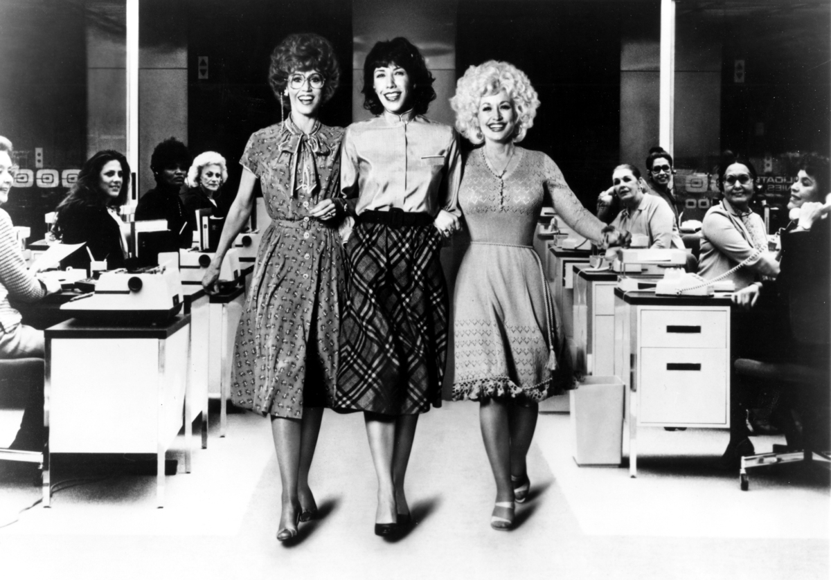 (L-R) Jane Fonda, Lily Tomlin and Dolly Parton act in a scene from the movie “9 to 5” which was released in 1980.Photo by Michael Ochs Archives/Getty Images