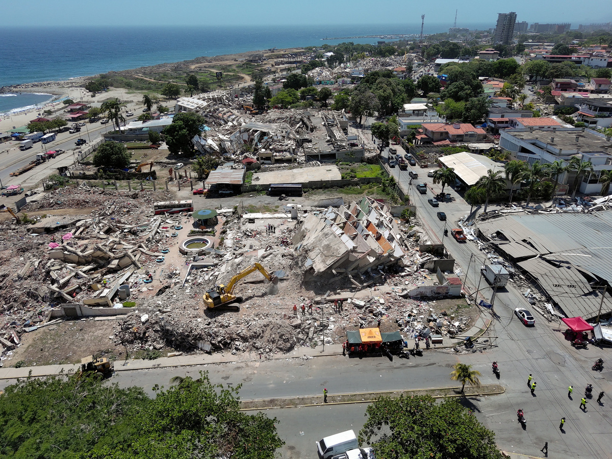 A drone view shows collapsed buildings in the aftermath of the June 24 earthquakes, in La Guaira, Venezuela, July 1, 2026. REUTERS/Ricardo Arduengo