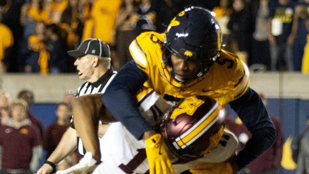  Sep 13, 2025; Berkeley, California, USA; California Golden Bears defensive back Hezekiah Masses (5) breaks up a pass intended for Minnesota Golden Gophers wide receiver Javon Tracy (11) during the third quarter at California Memorial Stadium. The play was nullified by a defensive holding penalty. Mandatory Credit: D. Ross Cameron-Imagn Images | D. Ross Cameron-Imagn Images 