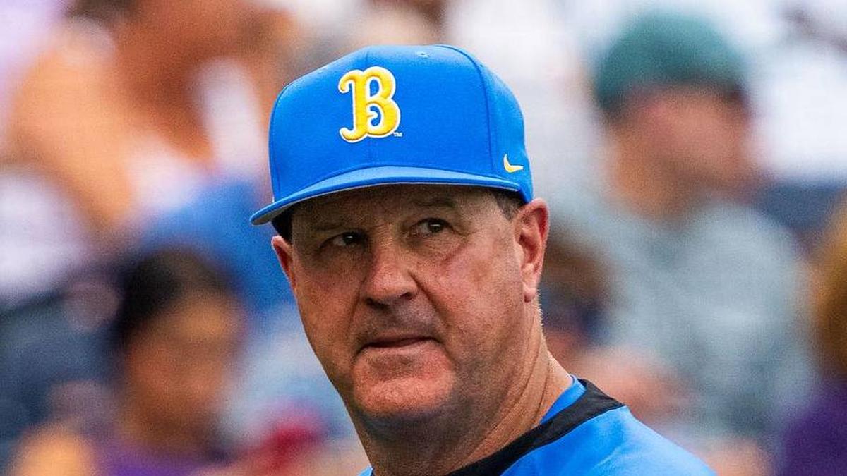  Jun 16, 2025; Omaha, Neb, USA; UCLA Bruins head coach John Savage walks off the field before the game against the LSU Tigers at Charles Schwab Field. Mandatory Credit: Dylan Widger-Imagn Images | Dylan Widger-Imagn Images 