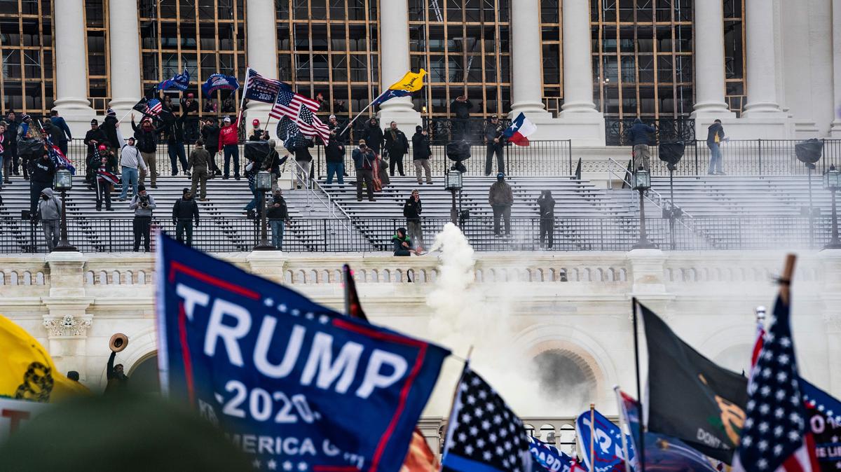 US-POLITICS-UNREST. Supporters of US President Donald Trump clash with the US Capitol police during a riot at the US Capitol on January 6, 2021, in Washington, DC. 