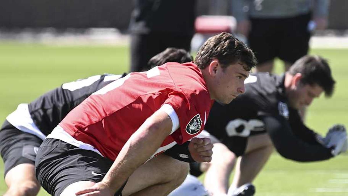  May 2, 2026; Henderson, NV, USA; Las Vegas Raiders quarterback Fernando Mendoza (15) runs through a drill during a Rookie Minicamp at Intermountain Health Performance Center. Mandatory Credit: Candice Ward-Imagn Images | Candice Ward-Imagn Images 