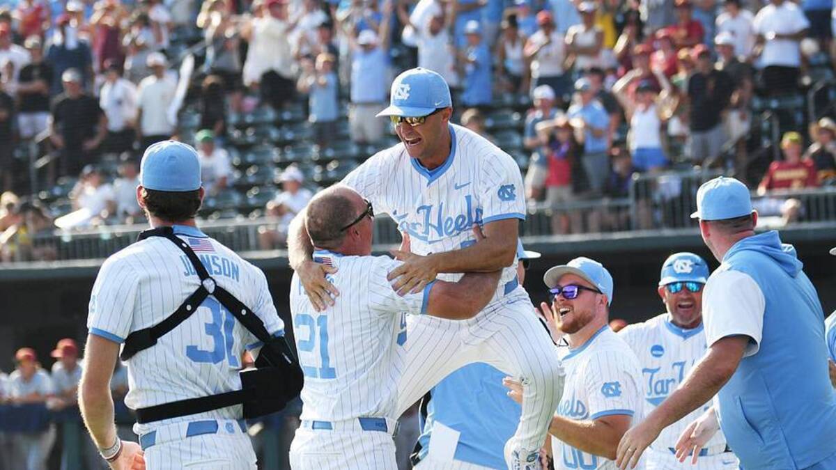  June 7, 2026; Chapel Hill, NC, USA; North Carolina Tar Heels head coach Scott Forbes celebrates a win with the coaching staff against the USC Trojans at Boshamer Stadium. Mandatory Credit: Zachary Taft-Imagn Images | Zachary Taft-Imagn Images 